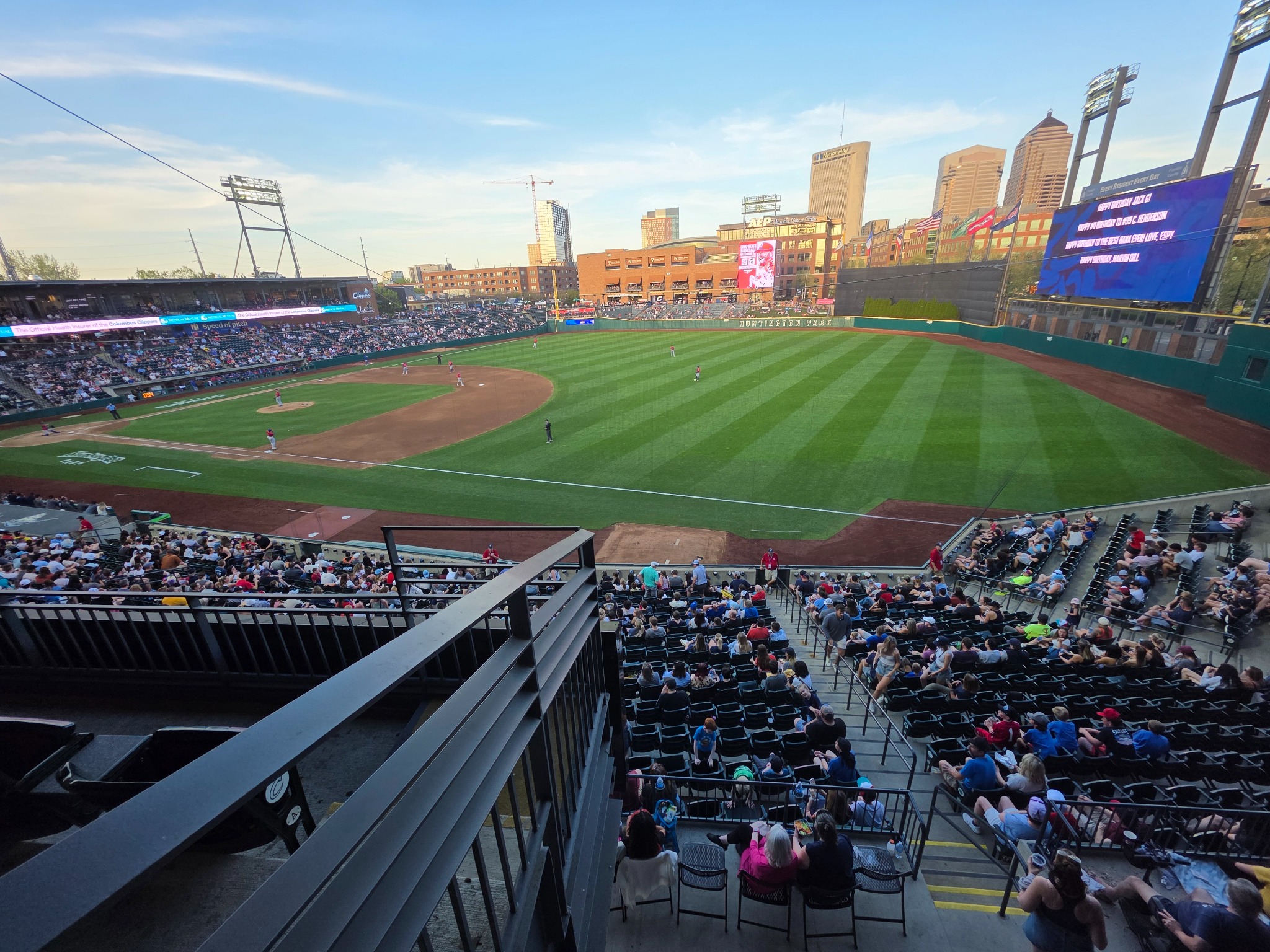 Ballpark and skyline at sunset