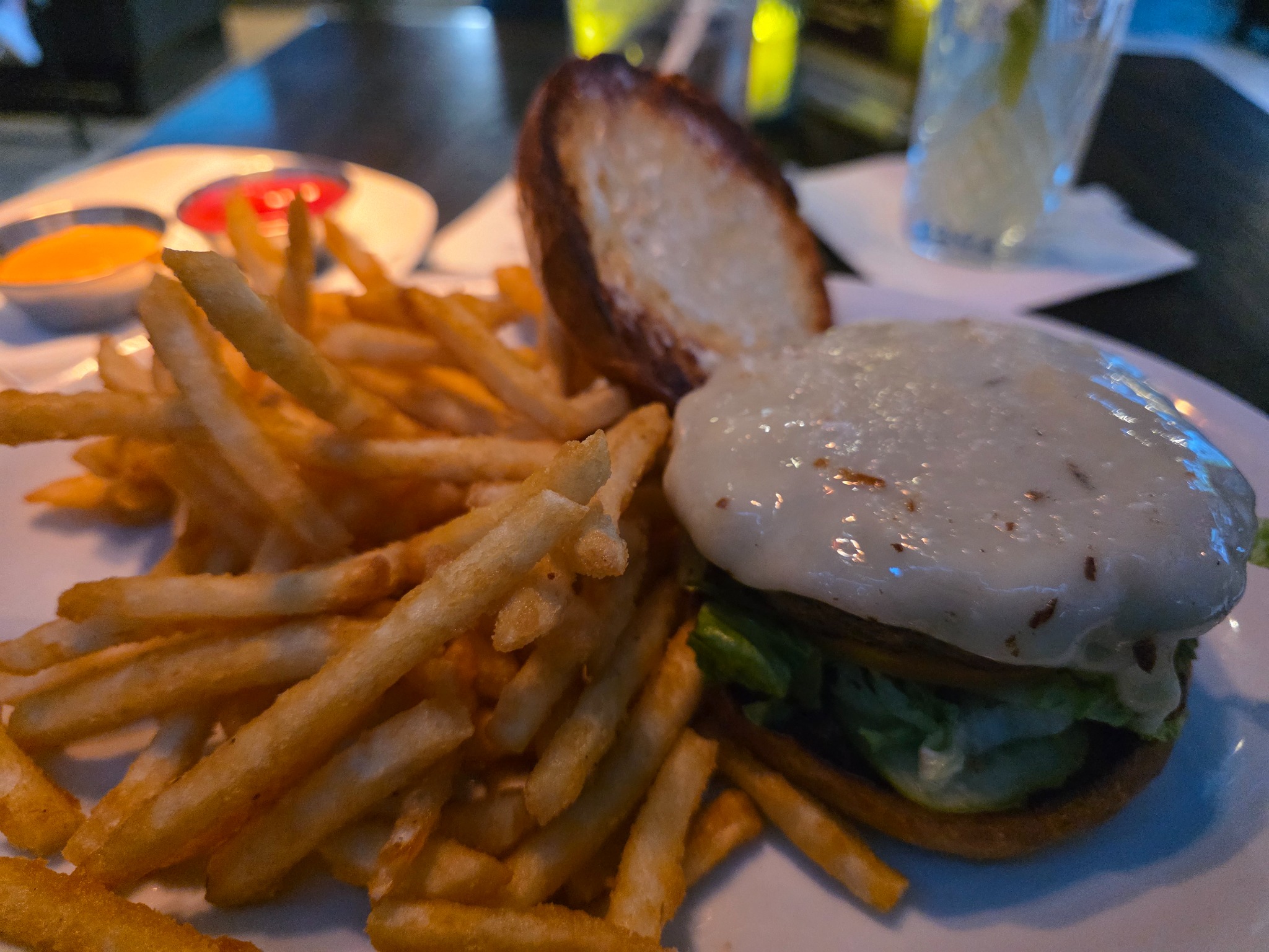Burger and fries on a restaurant table